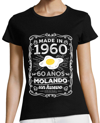 Image of 1960 60 years molando an egg