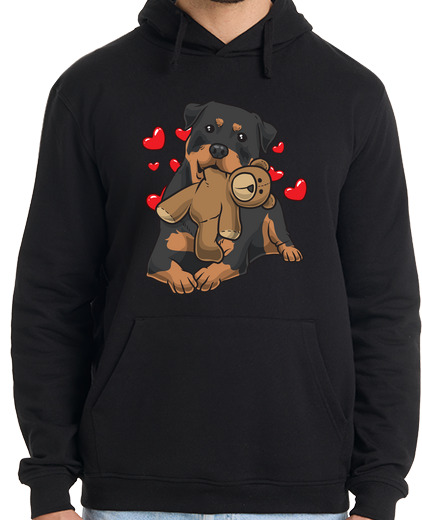 Image of rottweiler dog with stuffed animal and
