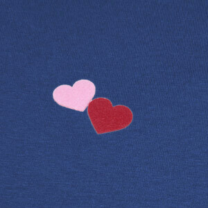 Multicolored heart shapes on a light ba T-shirts