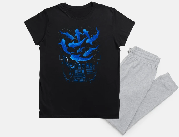 Pyjama astronaut with whale sharks