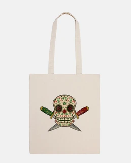 Calavera mexicana y puñales vintage desgastado