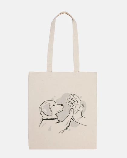 Borsa cane che fa il controllo con la borsa a mano