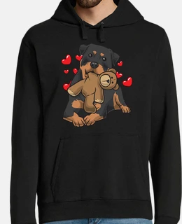 cane rottweiler con peluche e