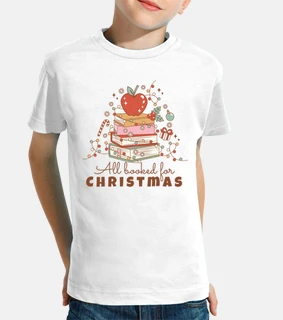 christmas book stack with festive apple