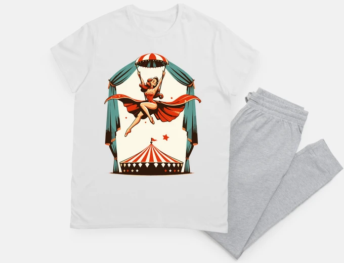Pyjama Circus girl give show on flying trapeze