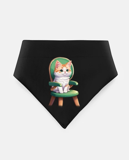 Mascotas ginger kitten on a green baby chair