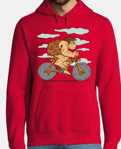 homme de cro-magnon qui fait du vélo