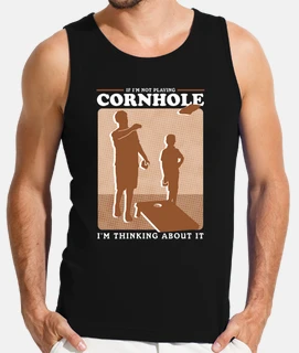joueur de cornball pensant à cornhole