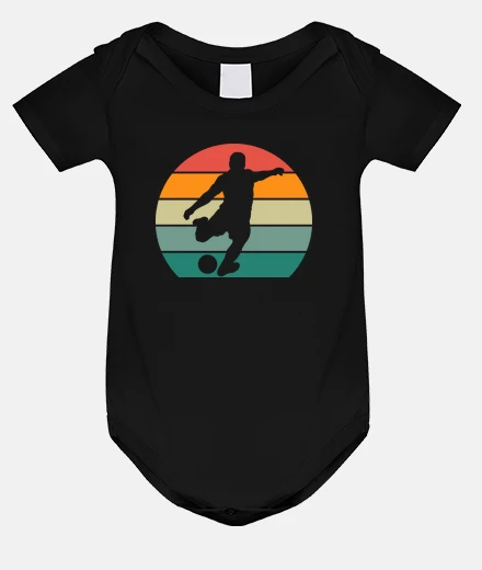Kids soccer player silhouette sunset
