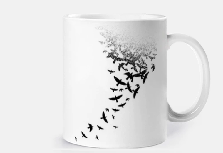 Tazza uccelli che volano